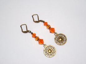 Handmade earrings: antiqued bronze sun charm topped by Swarovski crystals in sunrise orange/gold